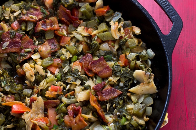 Callaloo in and saltfish in cast iron skillet