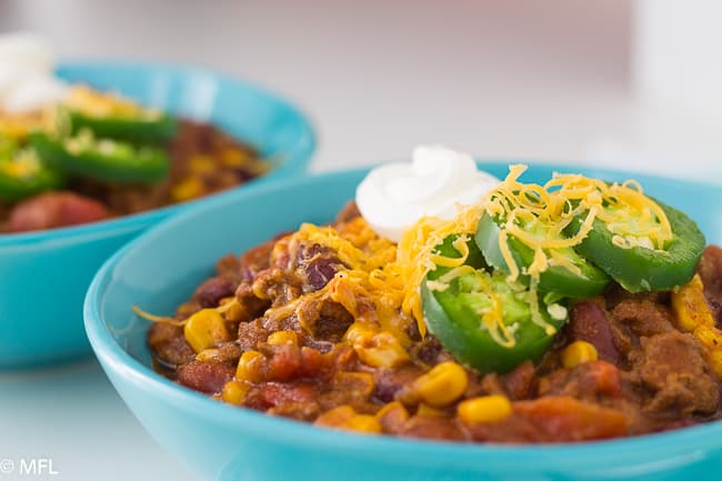 pressure cooker turkey chili in blue bowl 