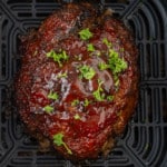 cooked meatloaf in air fryer basket