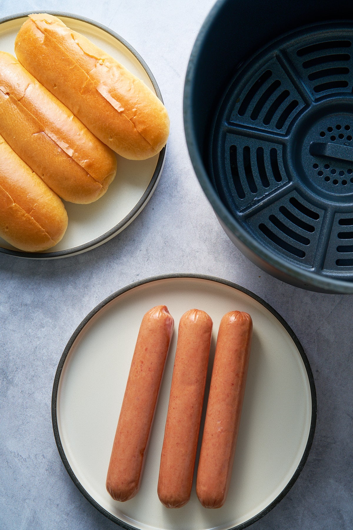 ingredients for air fryer hot dogs on table