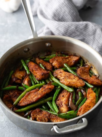 chicken and green bean stir fry in pan