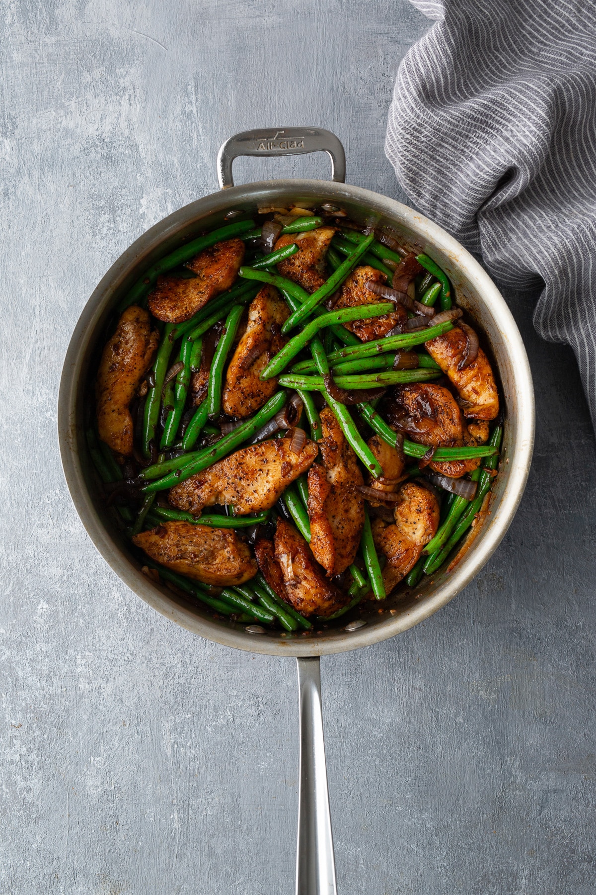 chicken and green beans in skillet