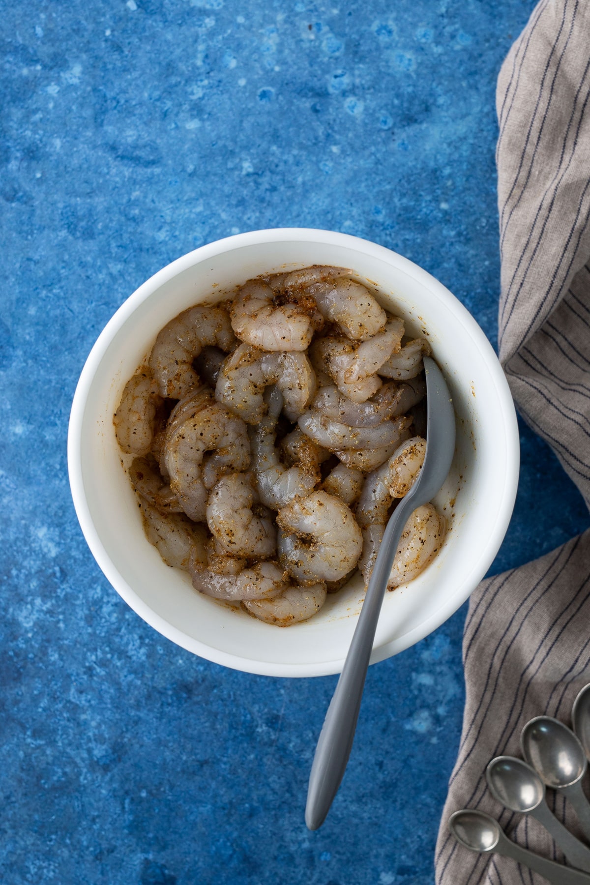 seasoned raw shrimp in a bowl