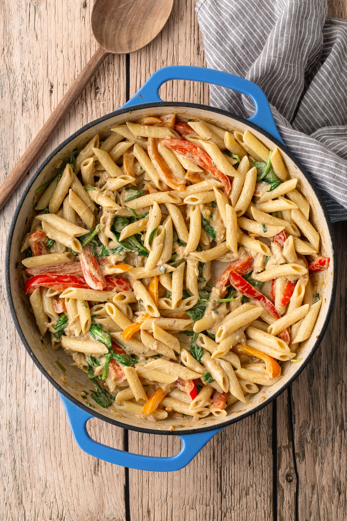 pasta with the sauteed peppers in skillet