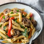 rasta pasta on plate with fork on side