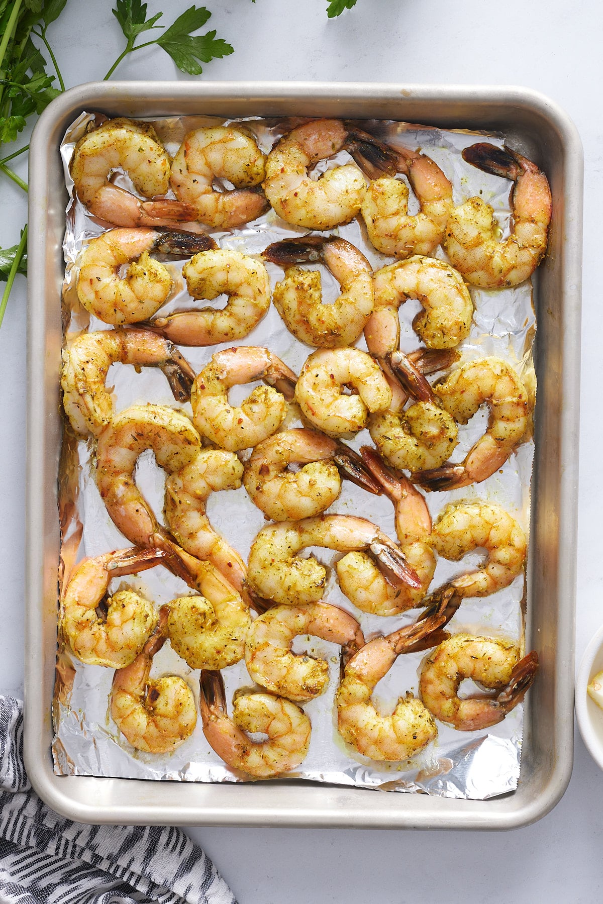 cooked shrimp on a baking sheet