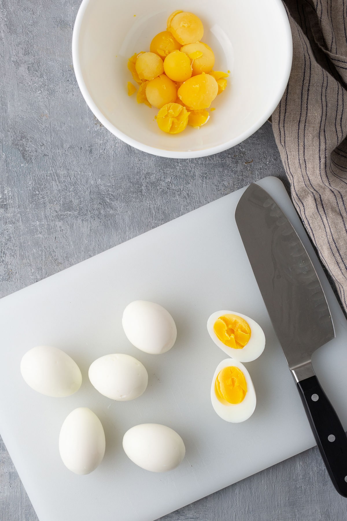 boiled eggs separated and yolks removed and placed in bowl