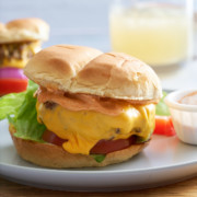 Close up of a prepared steamed cheeseburger with all of the toppings.