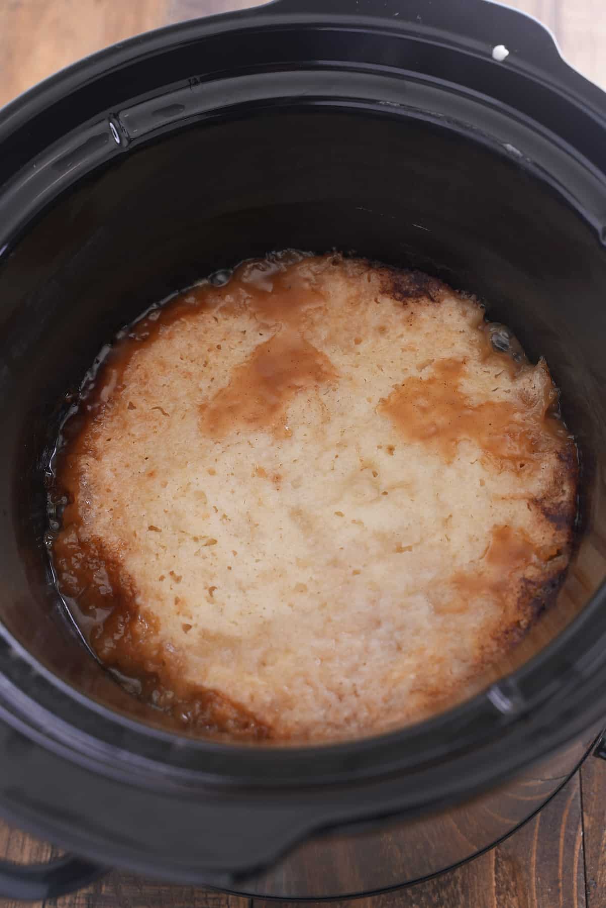 Cooked slow cooker peach cobbler.