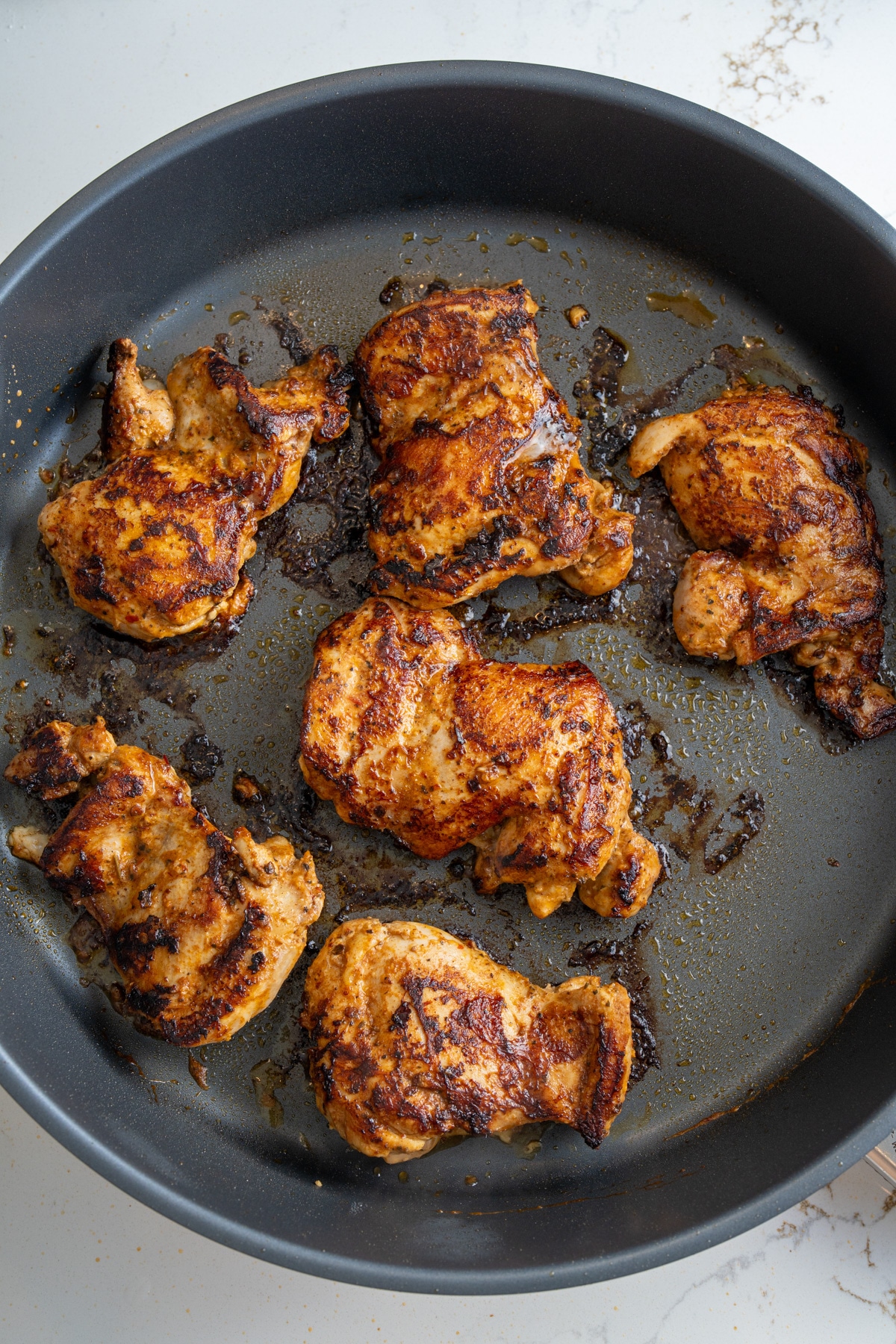 seared chicken in skillet