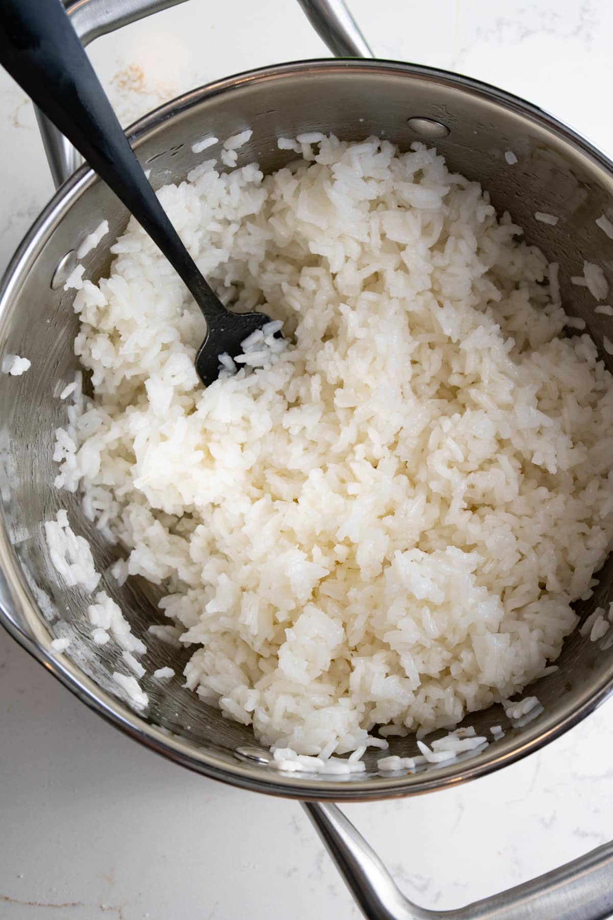 rice fluffed with fork