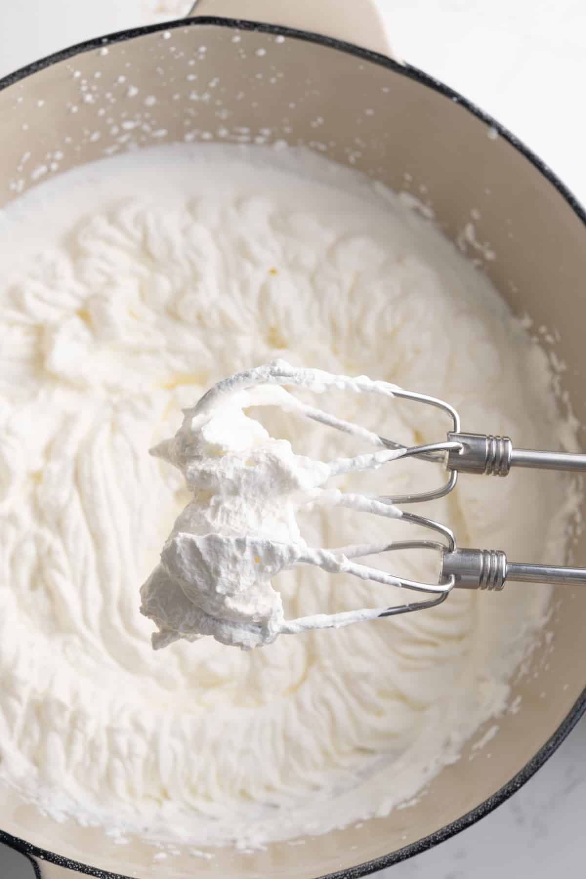 whipped heavy cream on mixture whisk