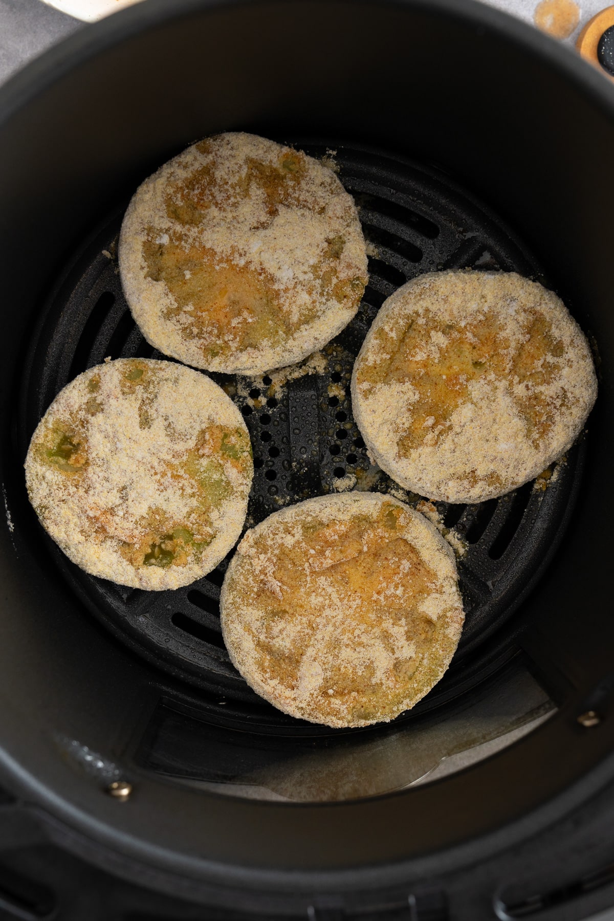 fried green tomatoes in air fryer basket