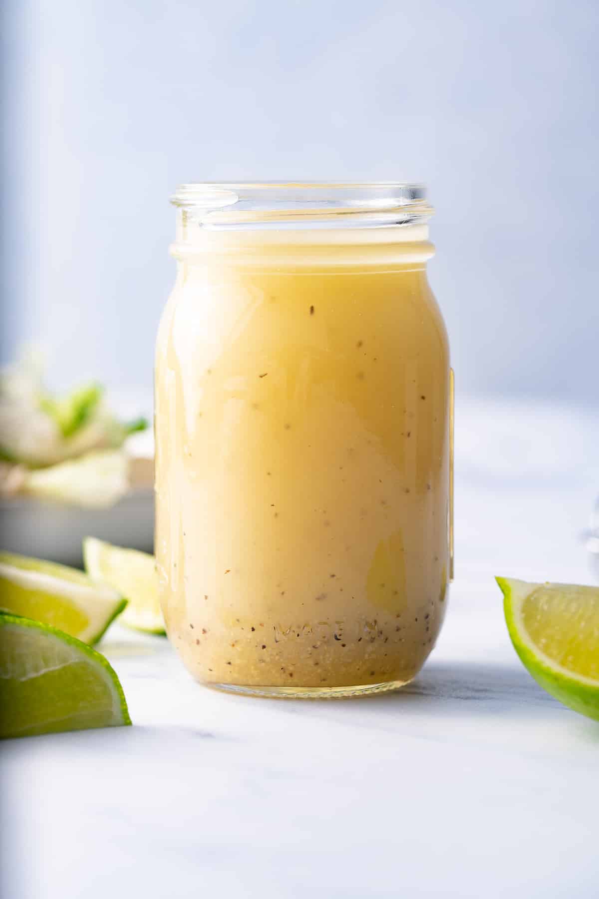 lime vinaigrette in glass bottle