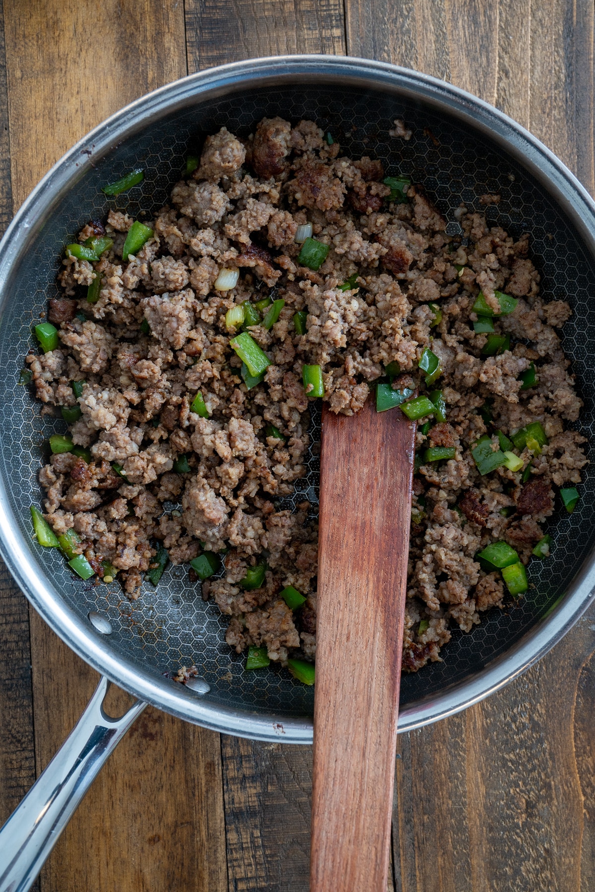 browned breakfast in a skillet with spatula sticking out