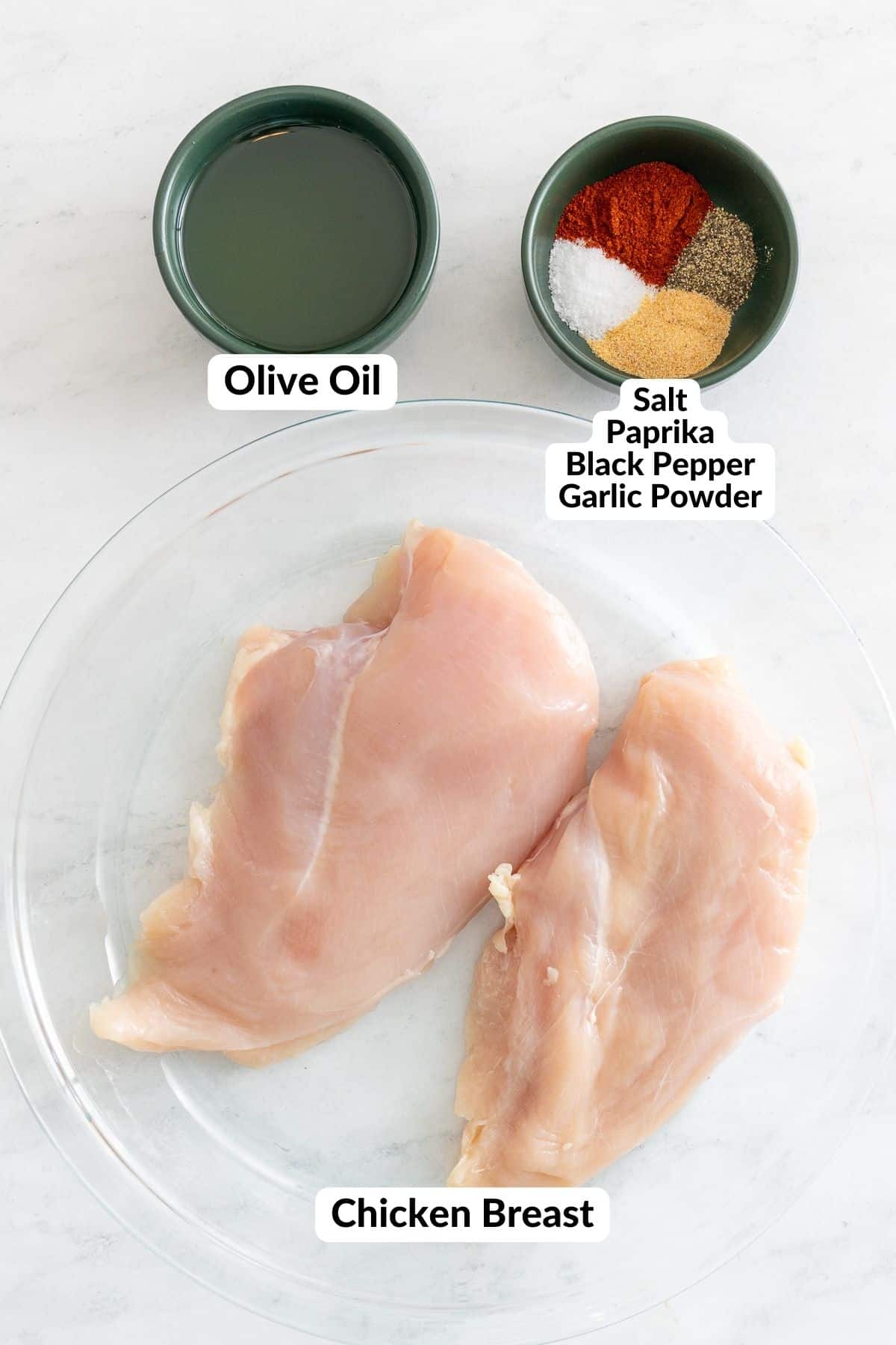 chicken breast, seasoning, and oil on ingredients with labels