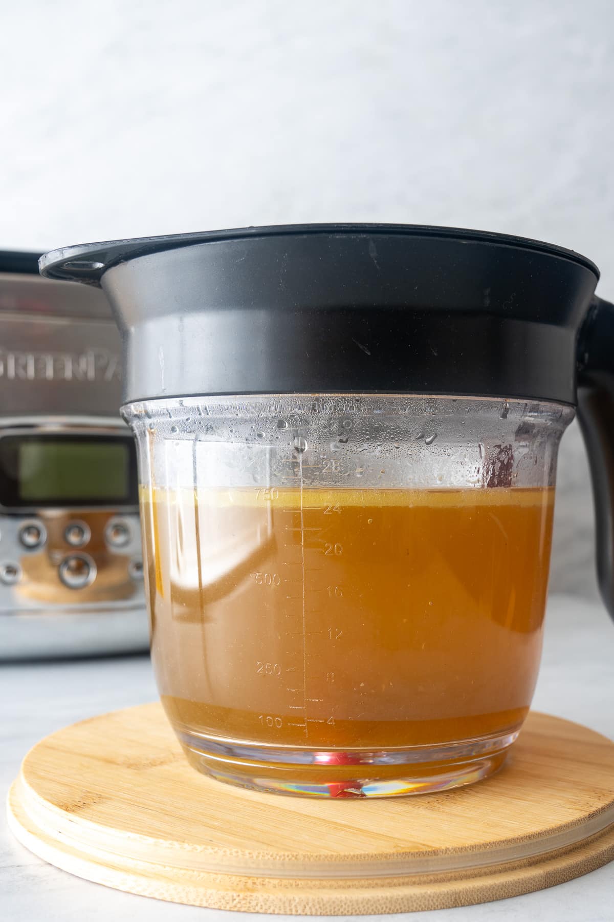 fat separator separating the fat from the broth