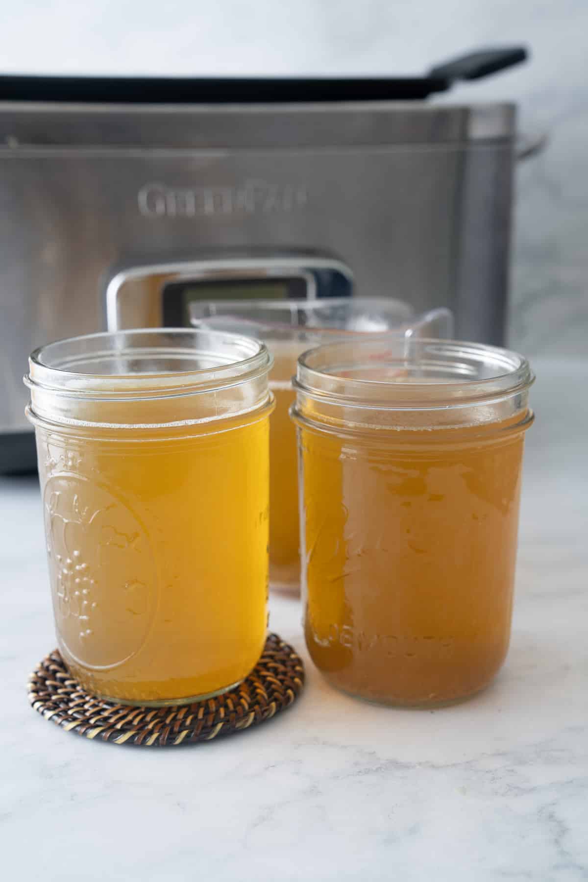 broth in jars from slow cooker