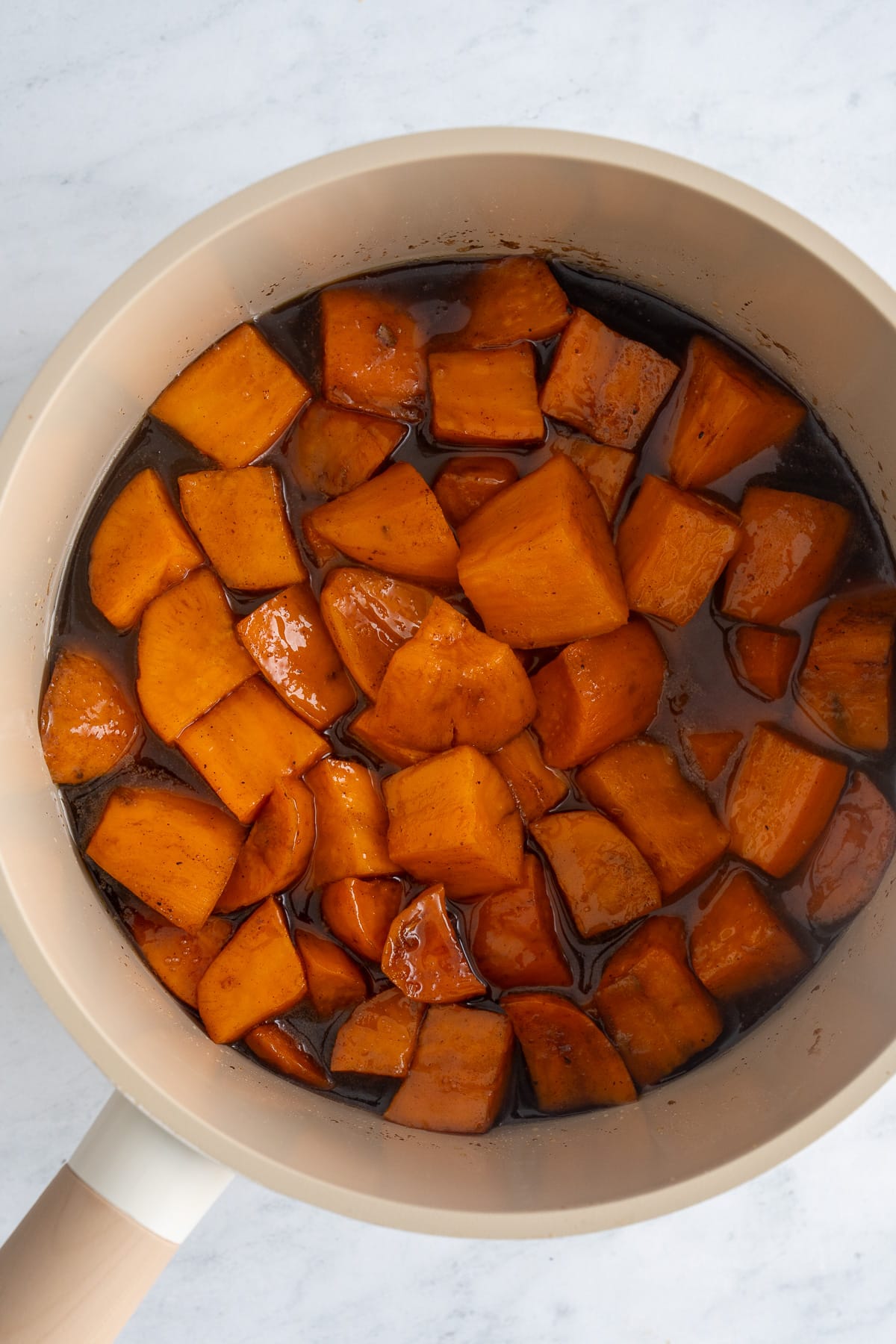 finished candied sweet potatoes in pot