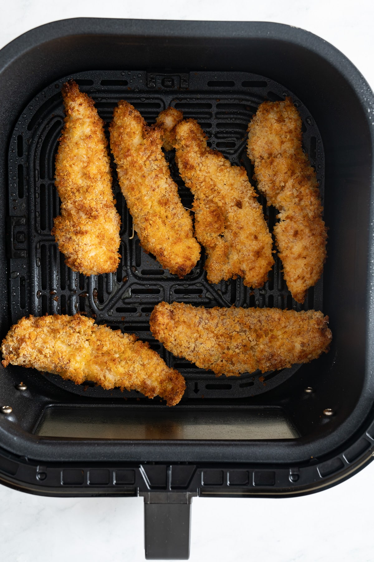 chicken tenders in air fryer basket