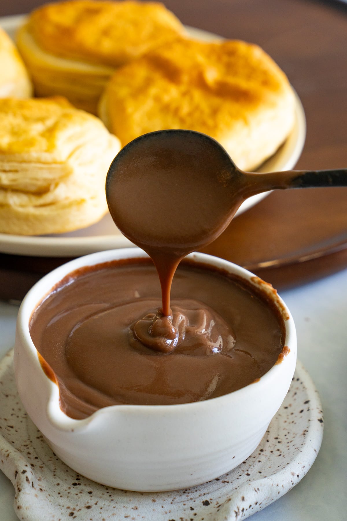 spoon holding up chocolate gravy