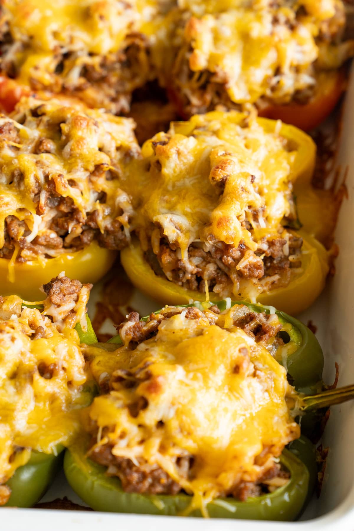 stuffed bell peppers in baking dish