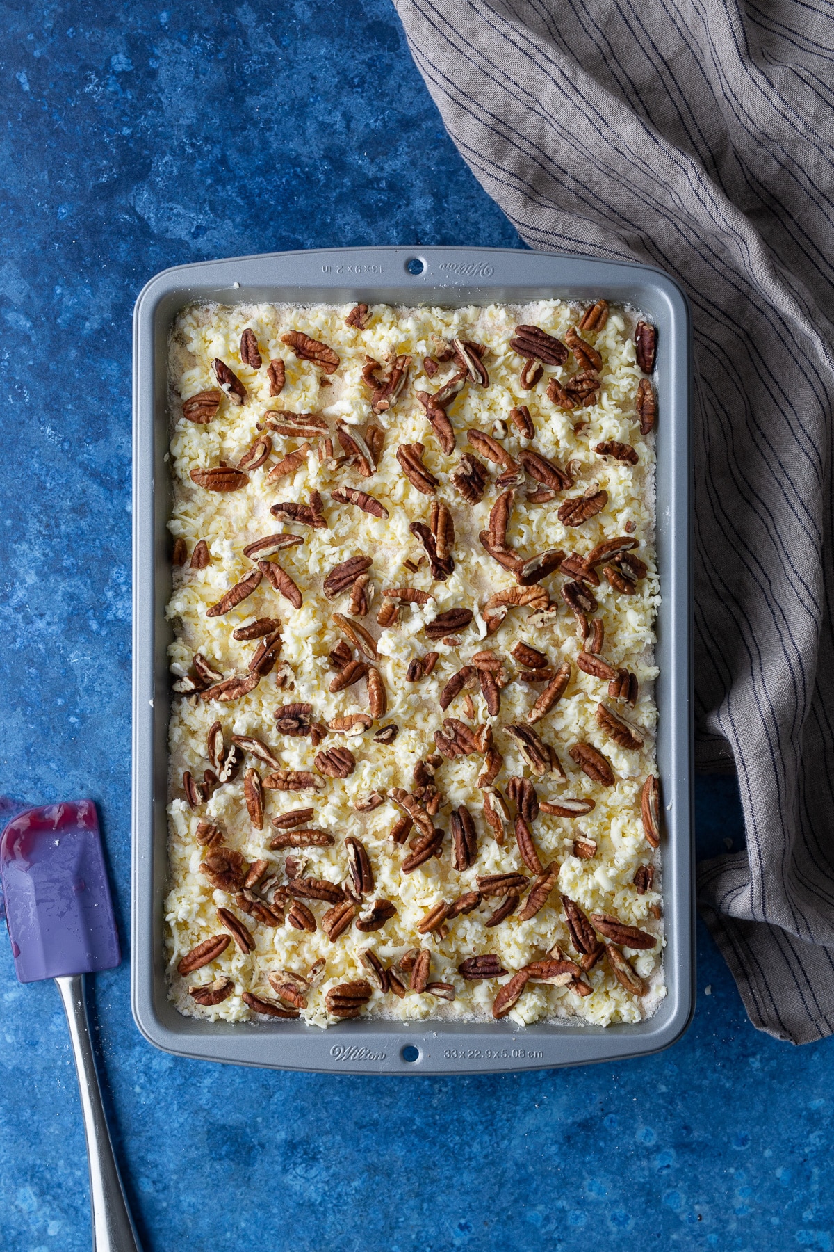 unbaked cherry pineapple dump cake in pan