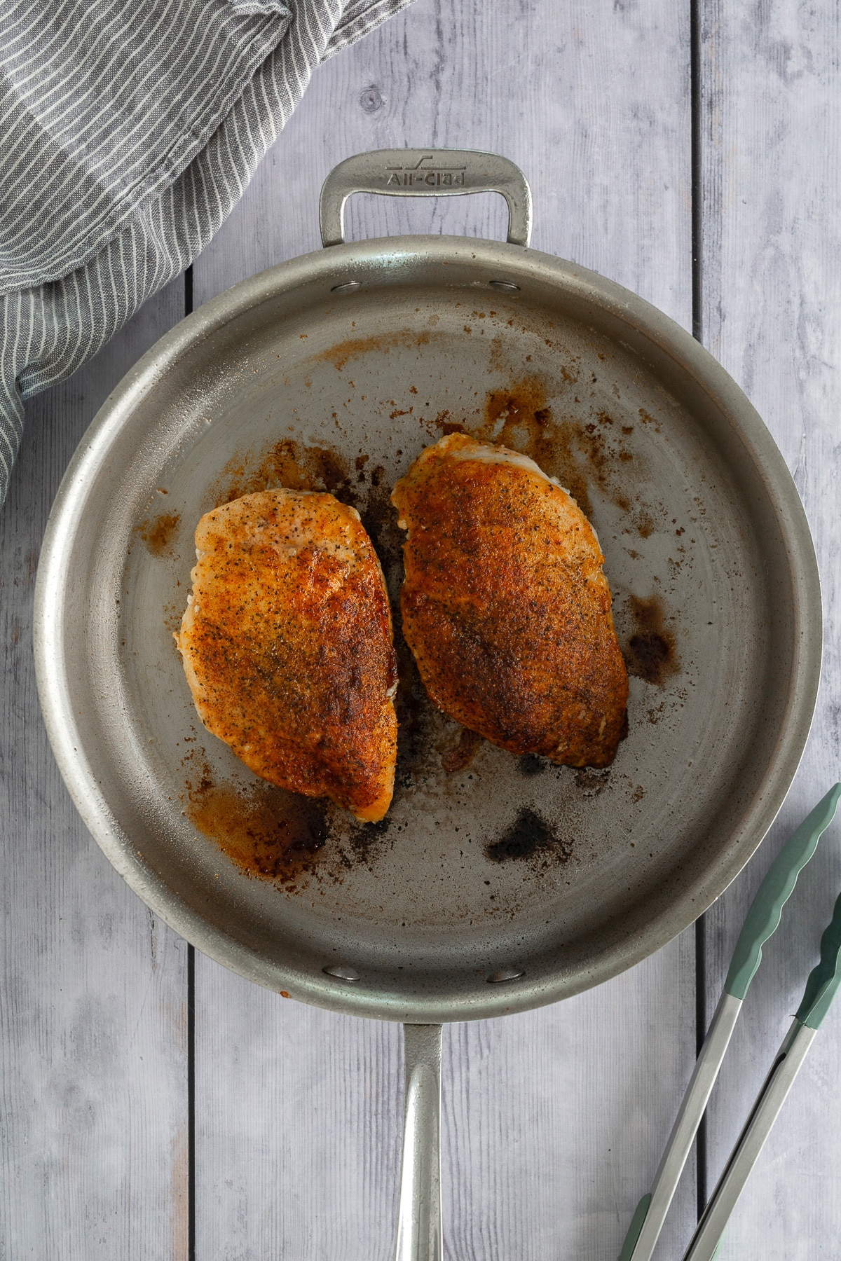 seared chicken breast in a skillet