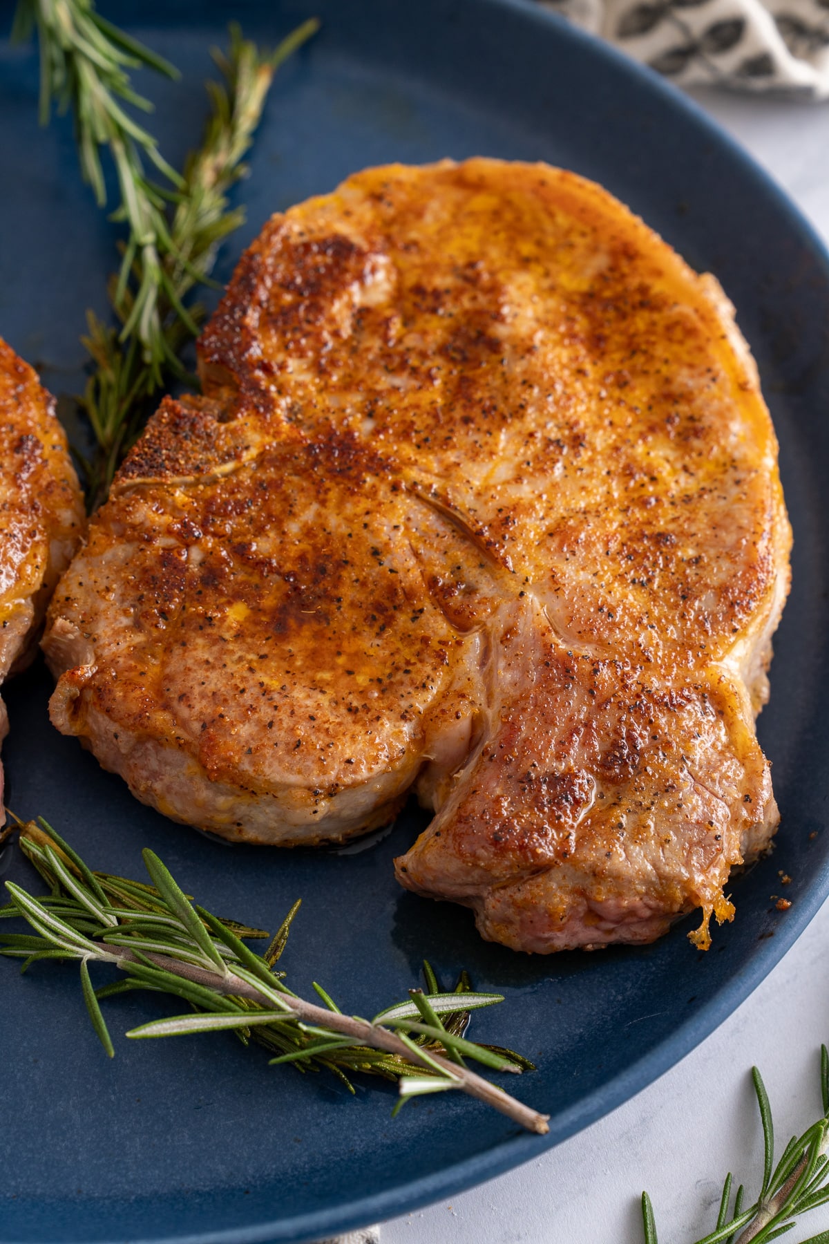 pan seared pork chop on plate