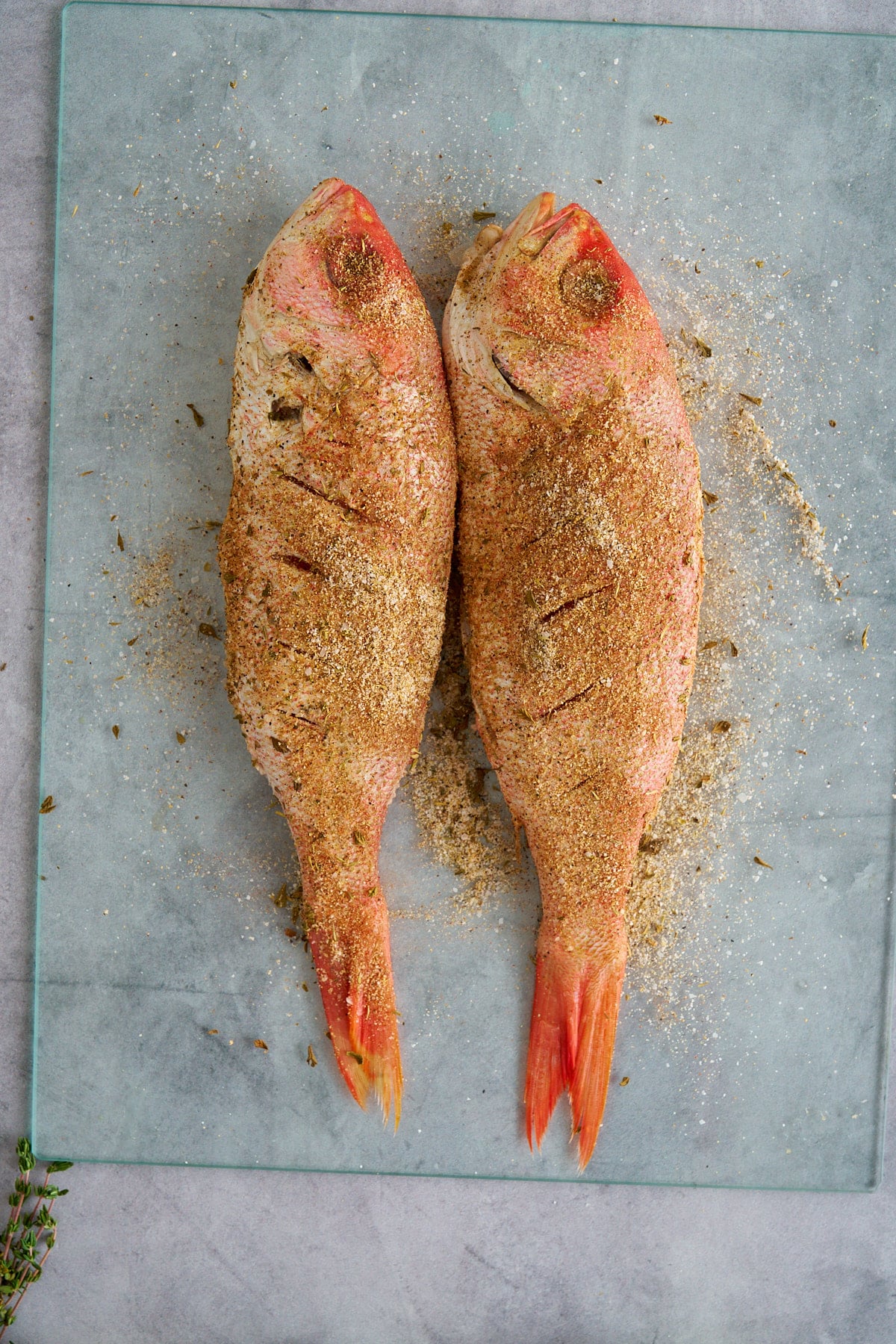 seasoned whole red snapper filets before cooking