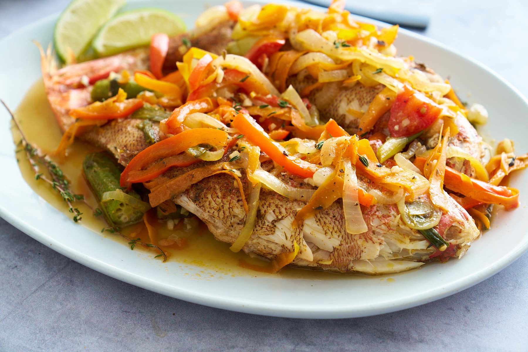 steamed fish on white platter