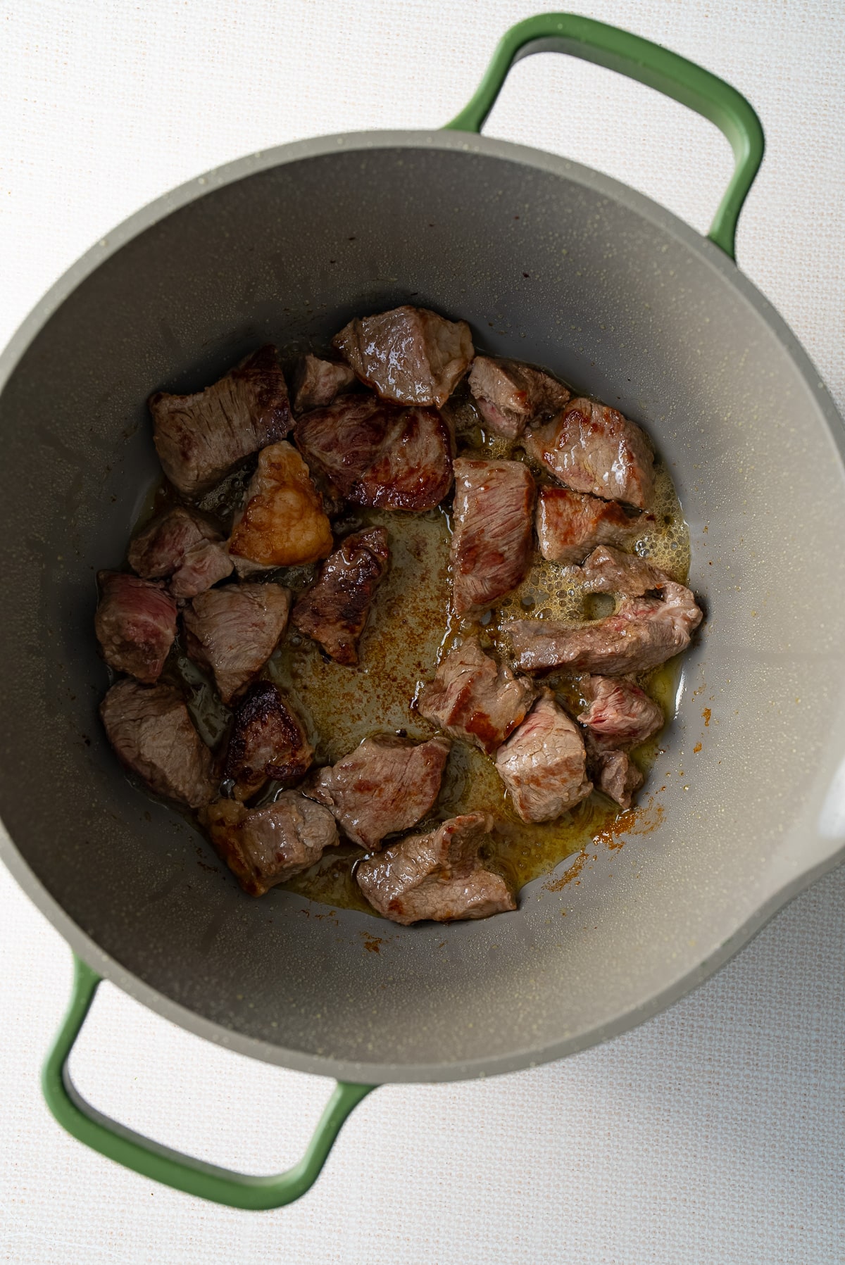 beef browning in pot