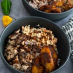 jerk chicken, rice, coleslaw, plantains in bowl to make a jerk chicken bowl