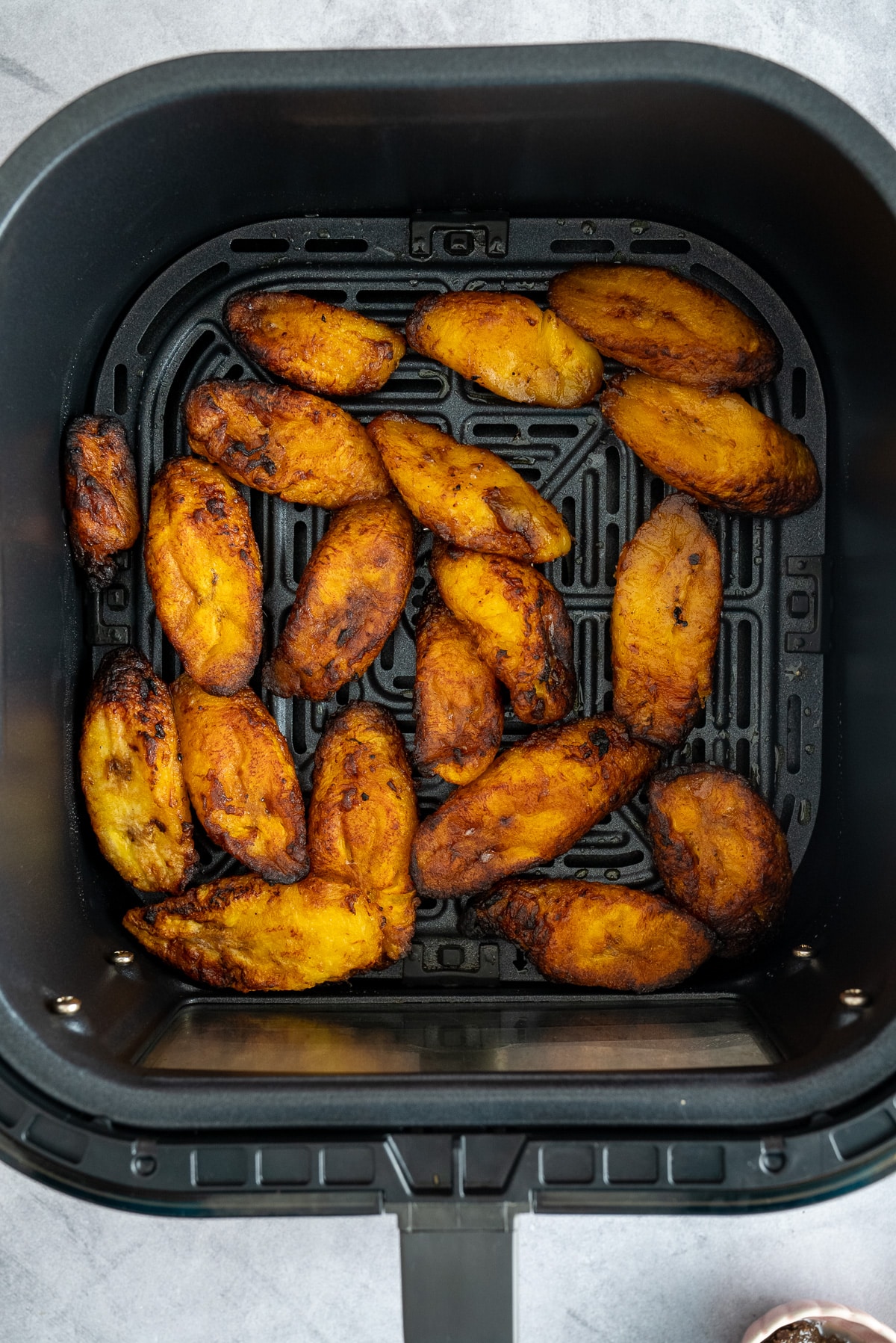 cooked plantains in air fryer basket