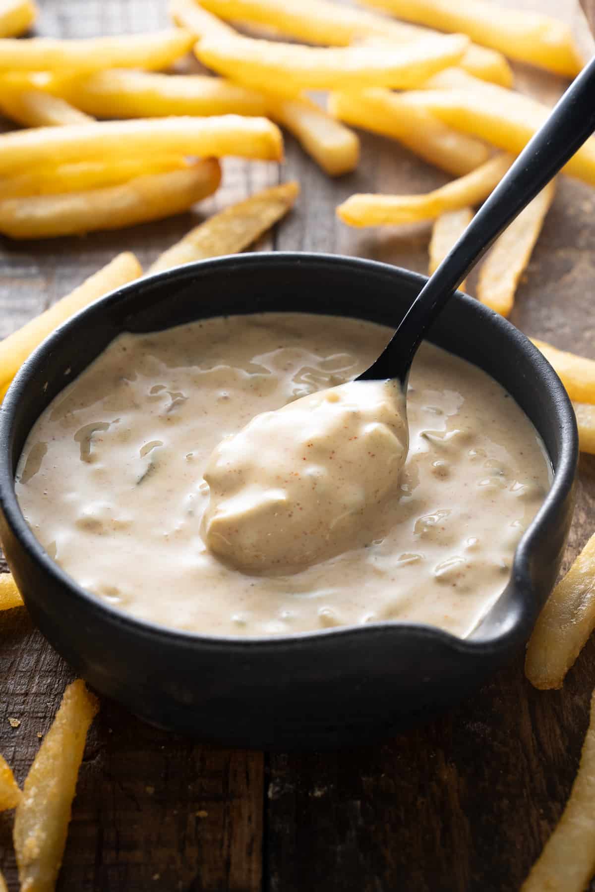 big mac sauce in bowl with spoon picking up