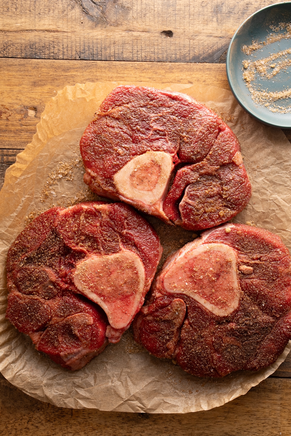 seasoned raw beef shanks on table