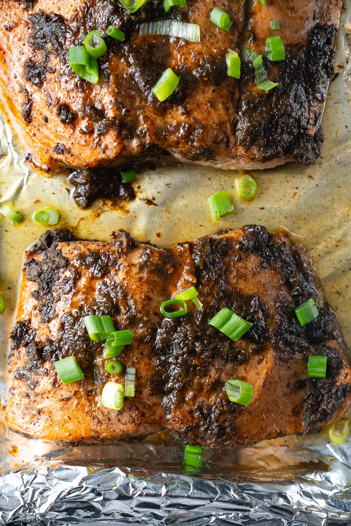 finished Jamaican jerk salmon on baking sheet