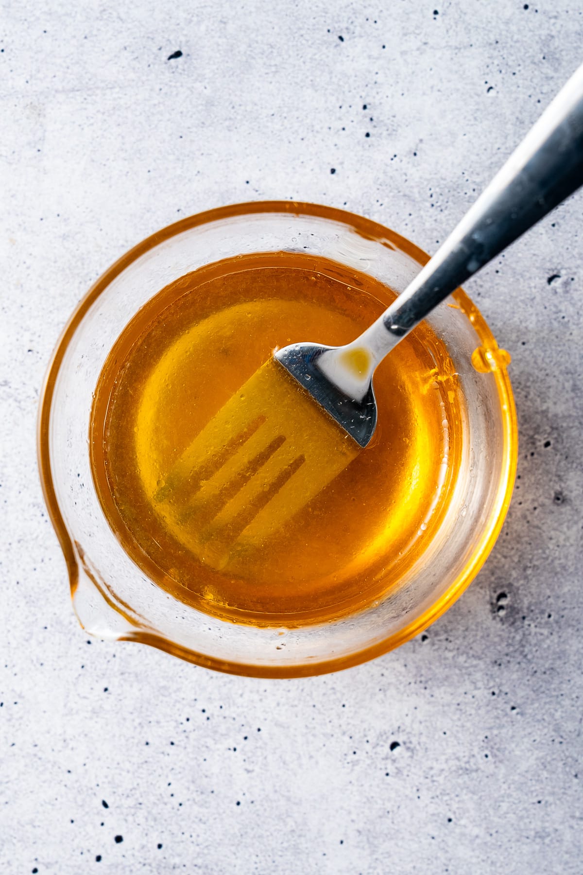 honey and lime juice mixed in bowl