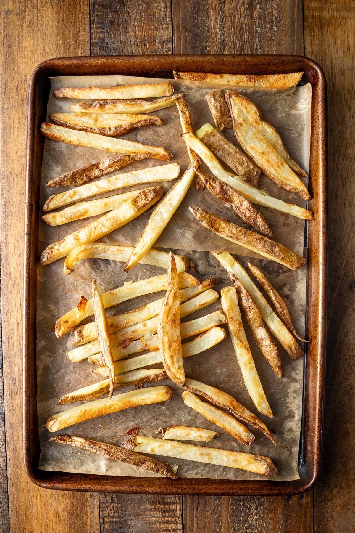 baked fries on baking sheet pan