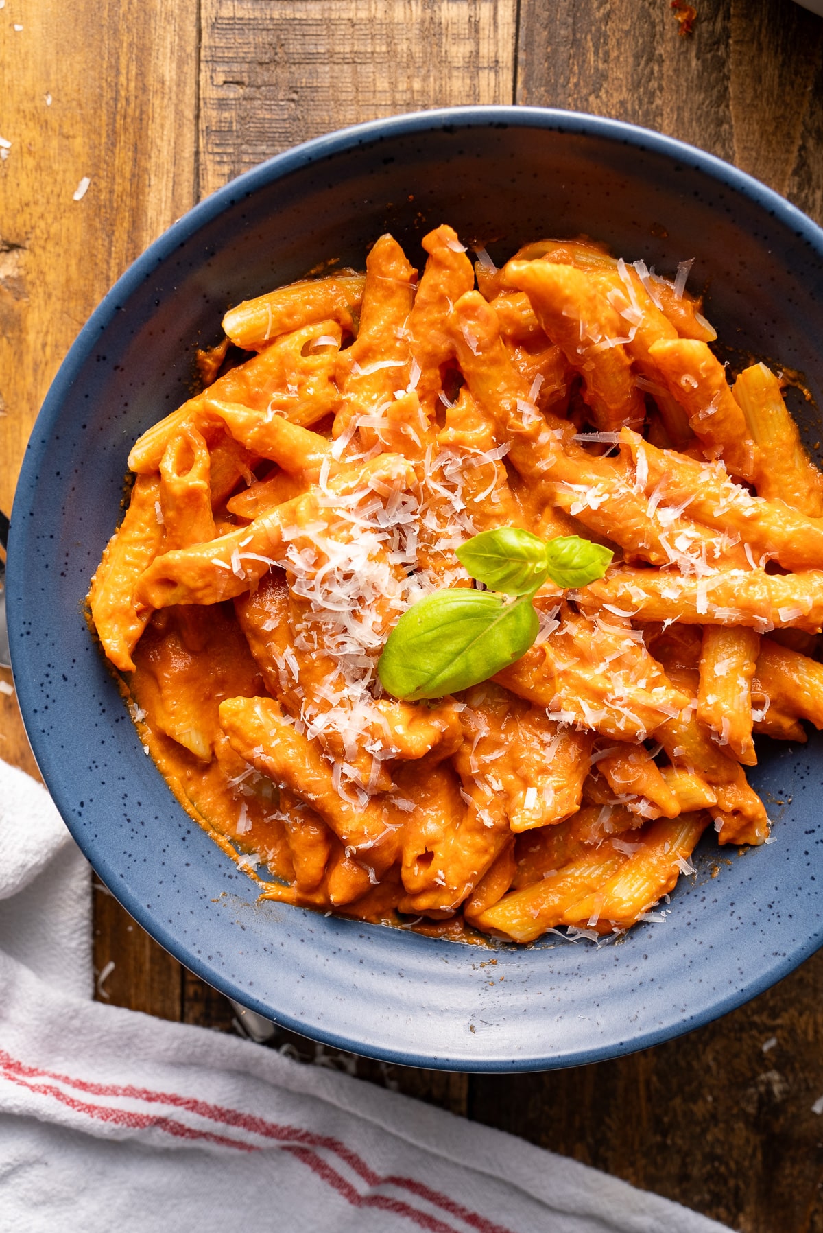 vodka sauce covering penne noodles