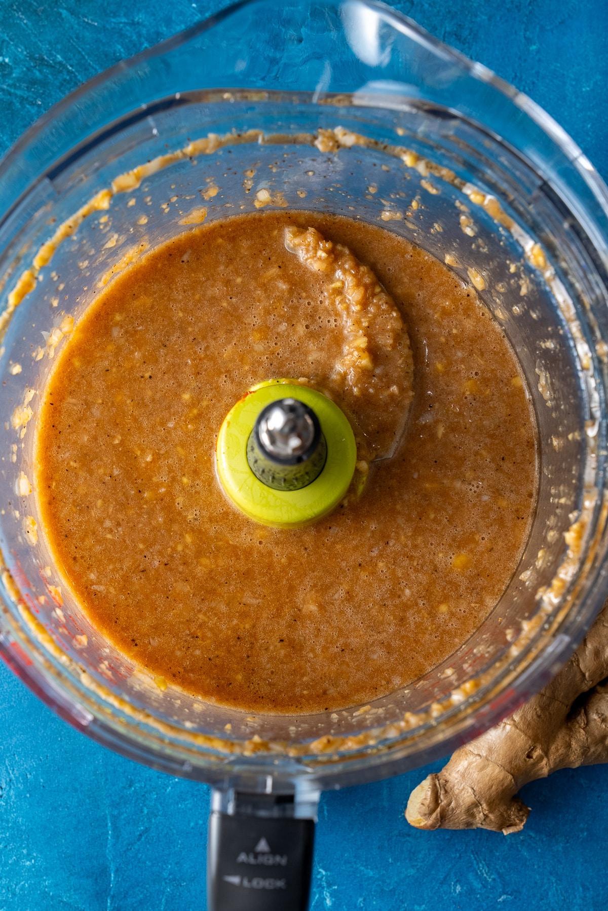 processed ingredients for the ginger dressing in the food processor bowl