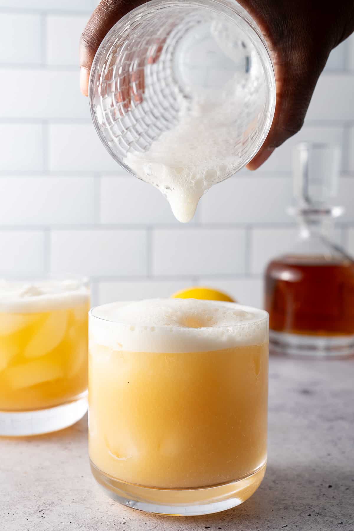 foam being poured into glass